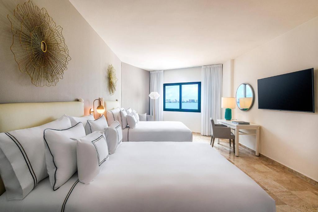 Suite The Level Grand con balcón